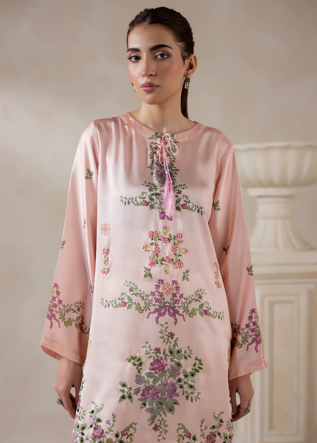 Women wearing silk co ord set for women, close-up of the print and hand embellishments on the charmeuse silk, Buraqstore