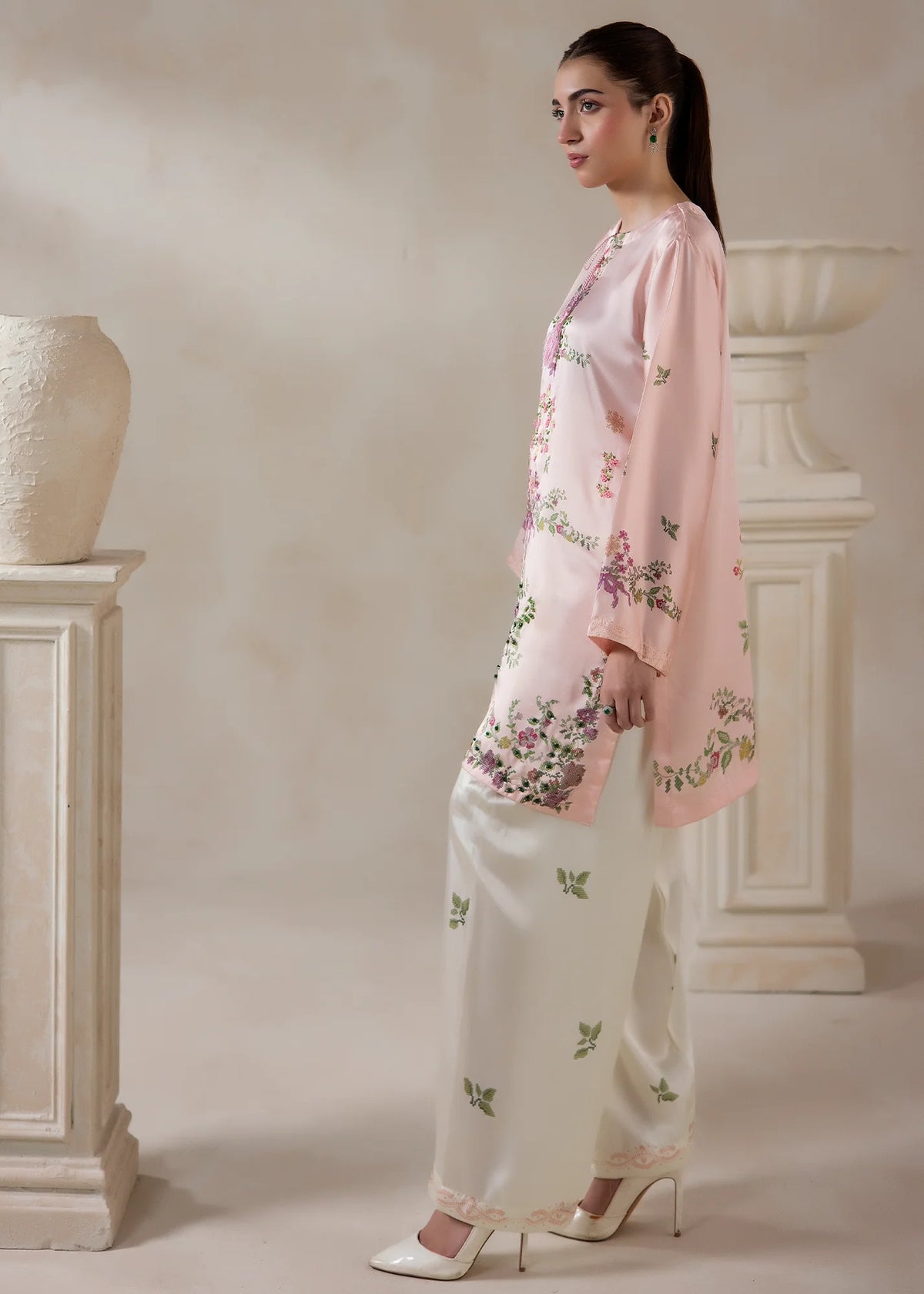 Model wearing silk co ord set for women, side view showing the fall of the charmeuse silk top and bottom, Buraqstore