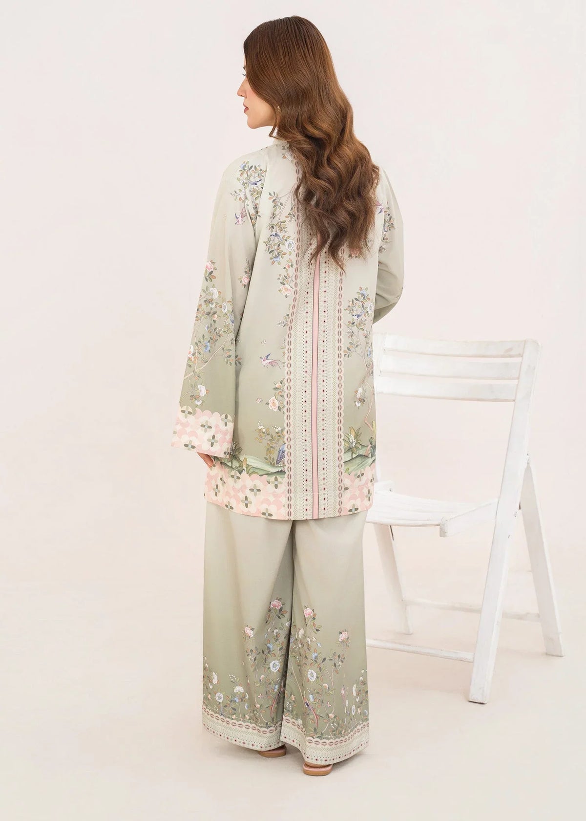 Women wearing green dress design, close-up of the print on the poly lawn shirt, Buraqstore