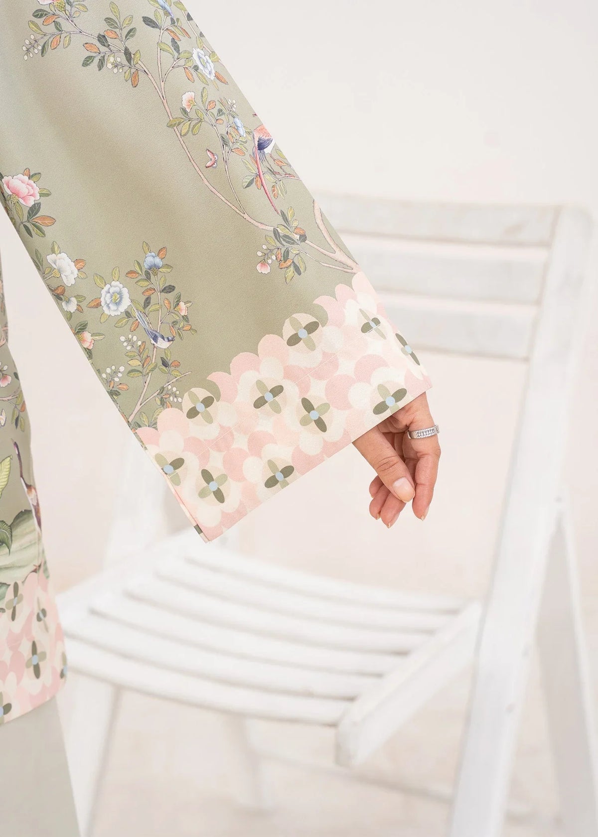 Women wearing green dress design, back view of the printed poly lawn shirt and trouser, Buraqstore