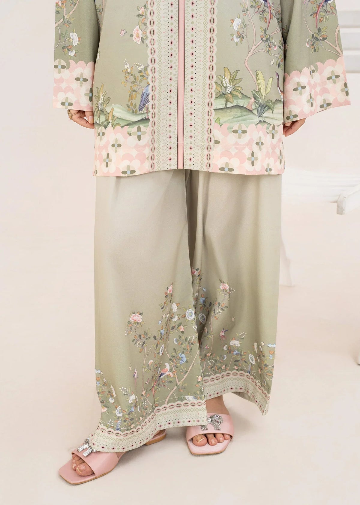 Model wearing green dress design as a casual outfit, shop printed poly lawn 2PC set at Buraqstore
