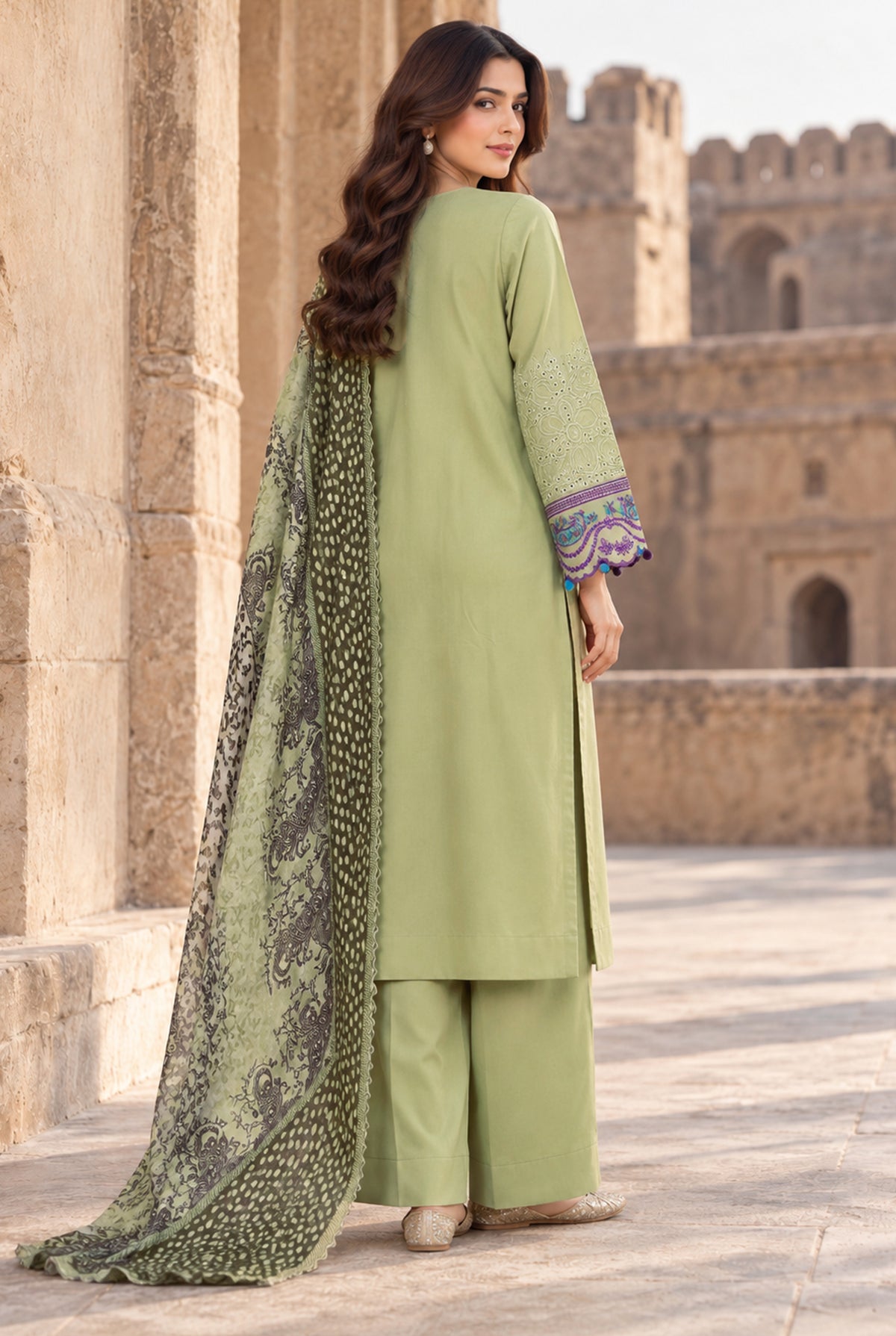 Women wearing pistachio green chikankari pk, close-up of the chikankari embroidery on the viscose shirt, Buraqstore