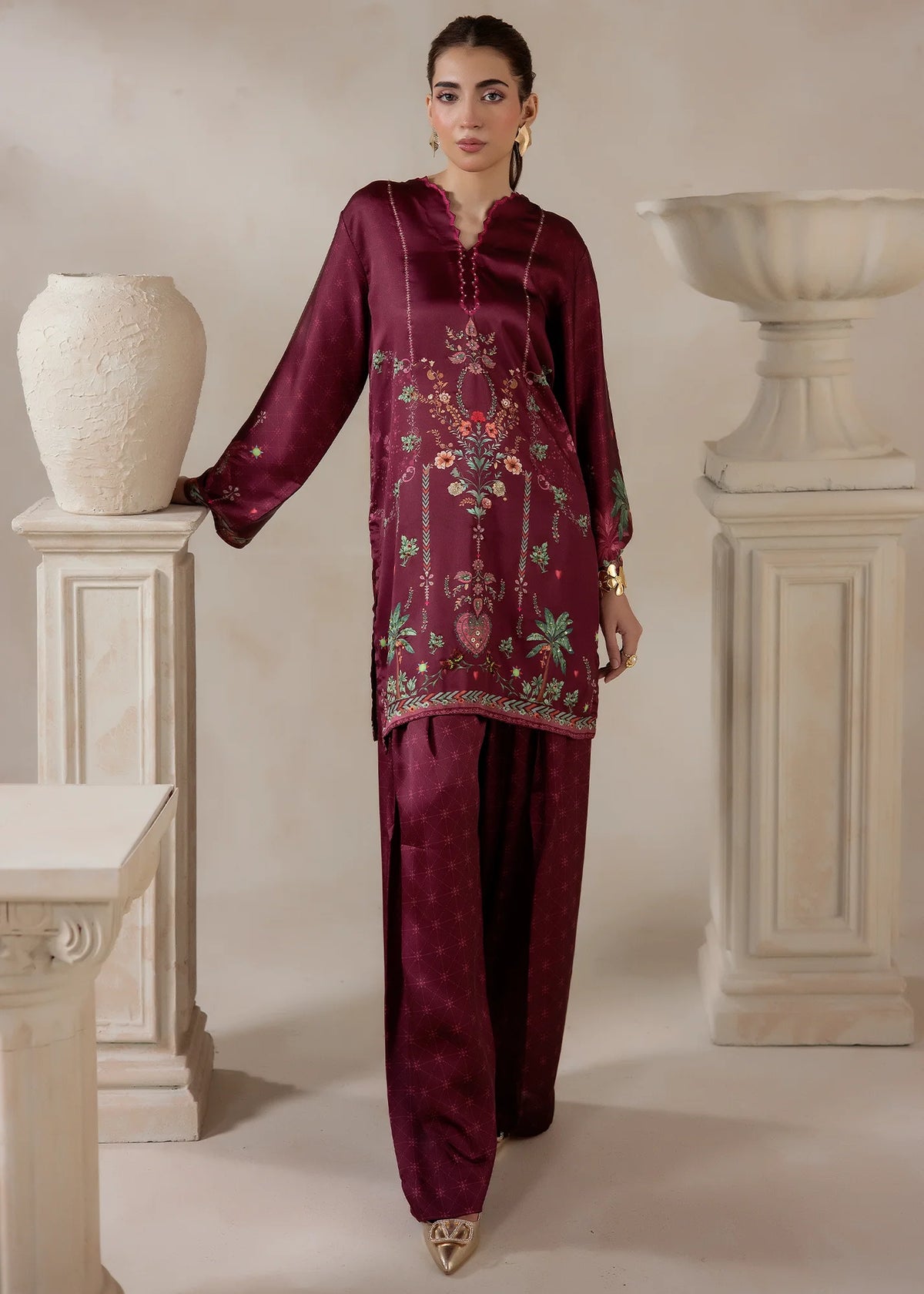 Model wearing silk co ord set in plum, a printed charmeuse silk top and bottom, front view from Buraqstore