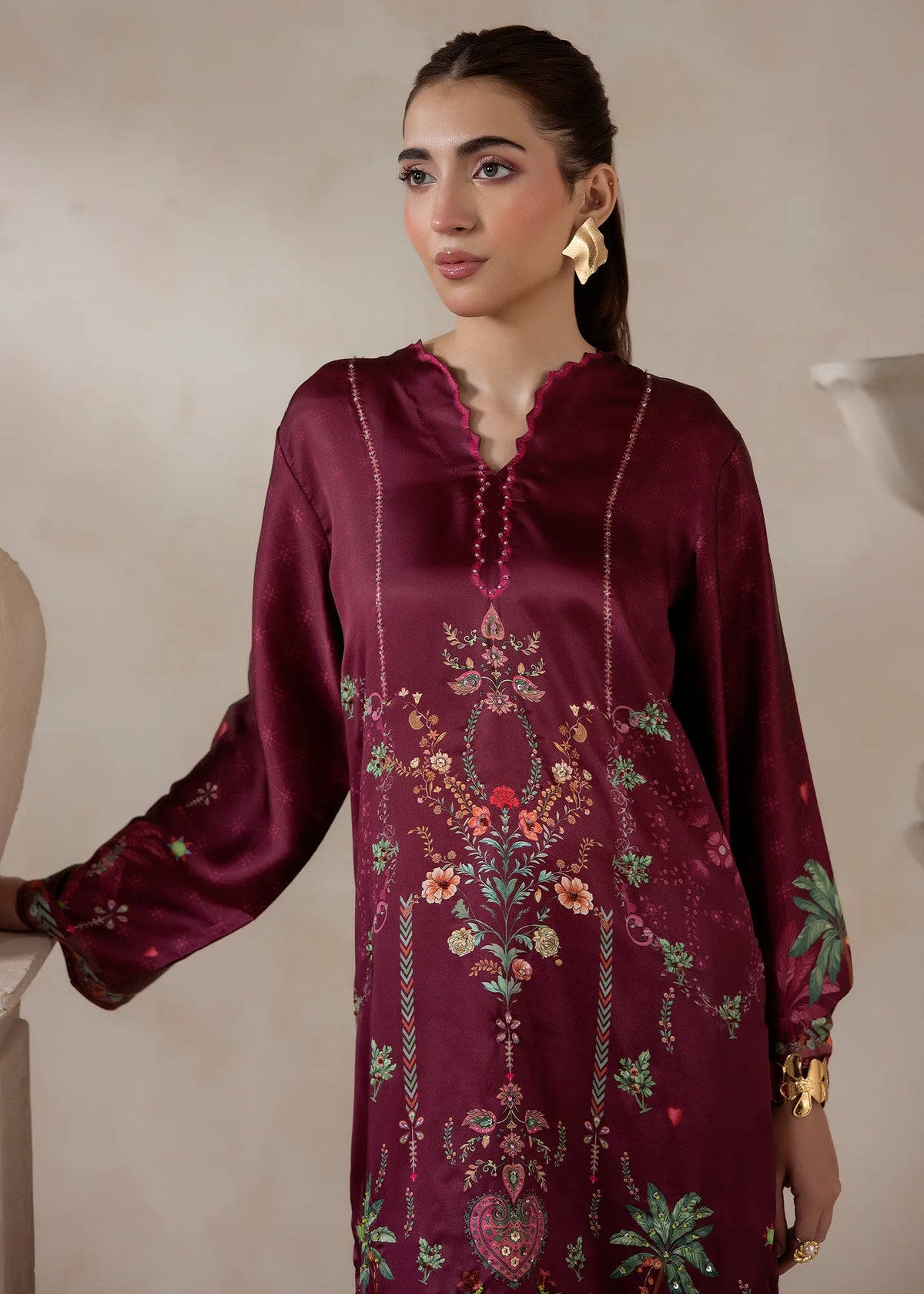 Women wearing silk co ord set, close-up of the print and hand embellishments on the charmeuse silk, Buraqstore