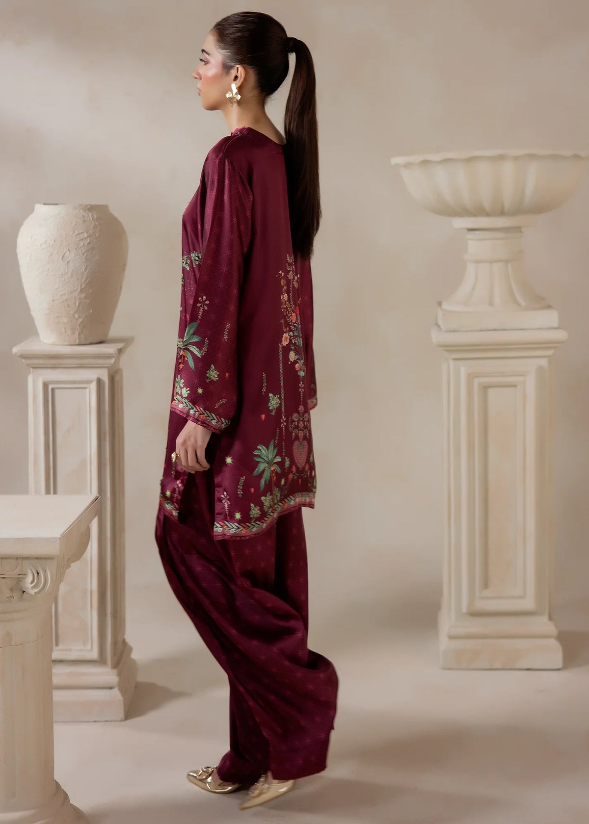 Model wearing silk co ord set, side view showing the fall of the charmeuse silk top and bottom, Buraqstore