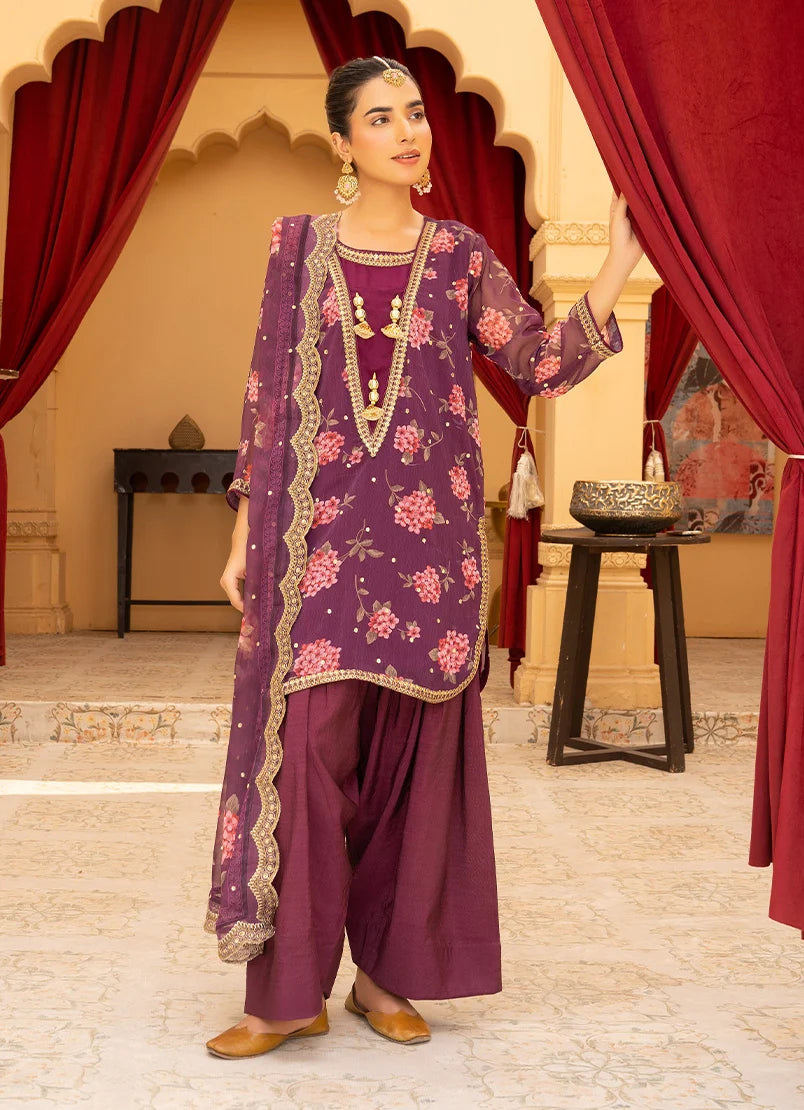 Model wearing purple dress design in plum, embroidered and printed silk shirt, trouser and dupatta, front view from Buraqstore