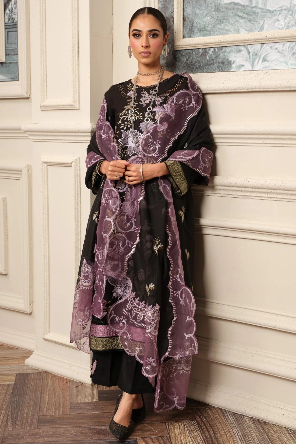 girl posing in black embroidered dress buraqstore with unstitched lawn details