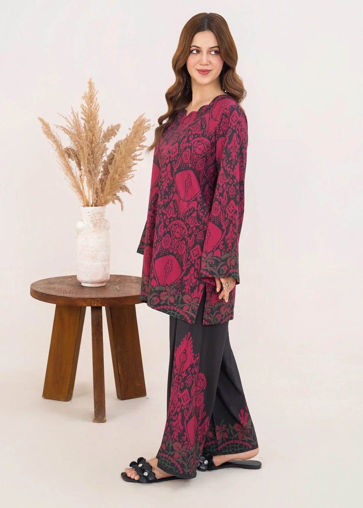 Women wearing red combination dress, close-up of the print on the poly lawn shirt, Buraqstore