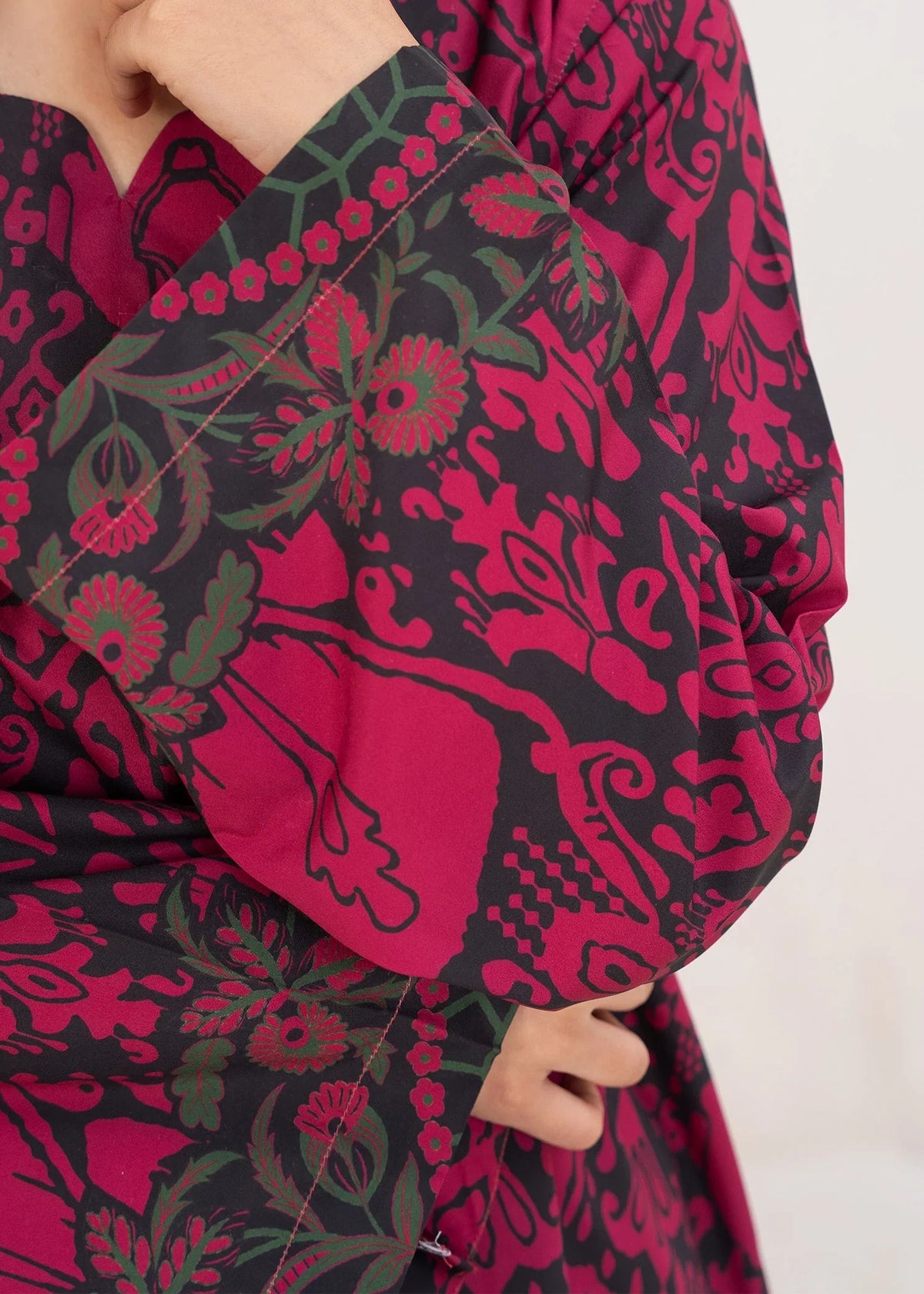 Model wearing red combination dress, side view showing the fit of the printed poly lawn 2PC, Buraqstore