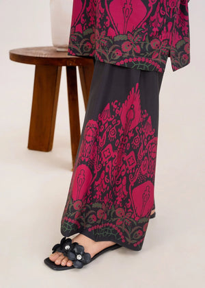 Model wearing red combination dress as a bold outfit, shop printed poly lawn 2PC set at Buraqstore