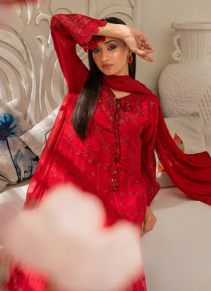 Model wearing red dress for women, side view showing the flow of the chiffon 3-piece set, Buraqstore