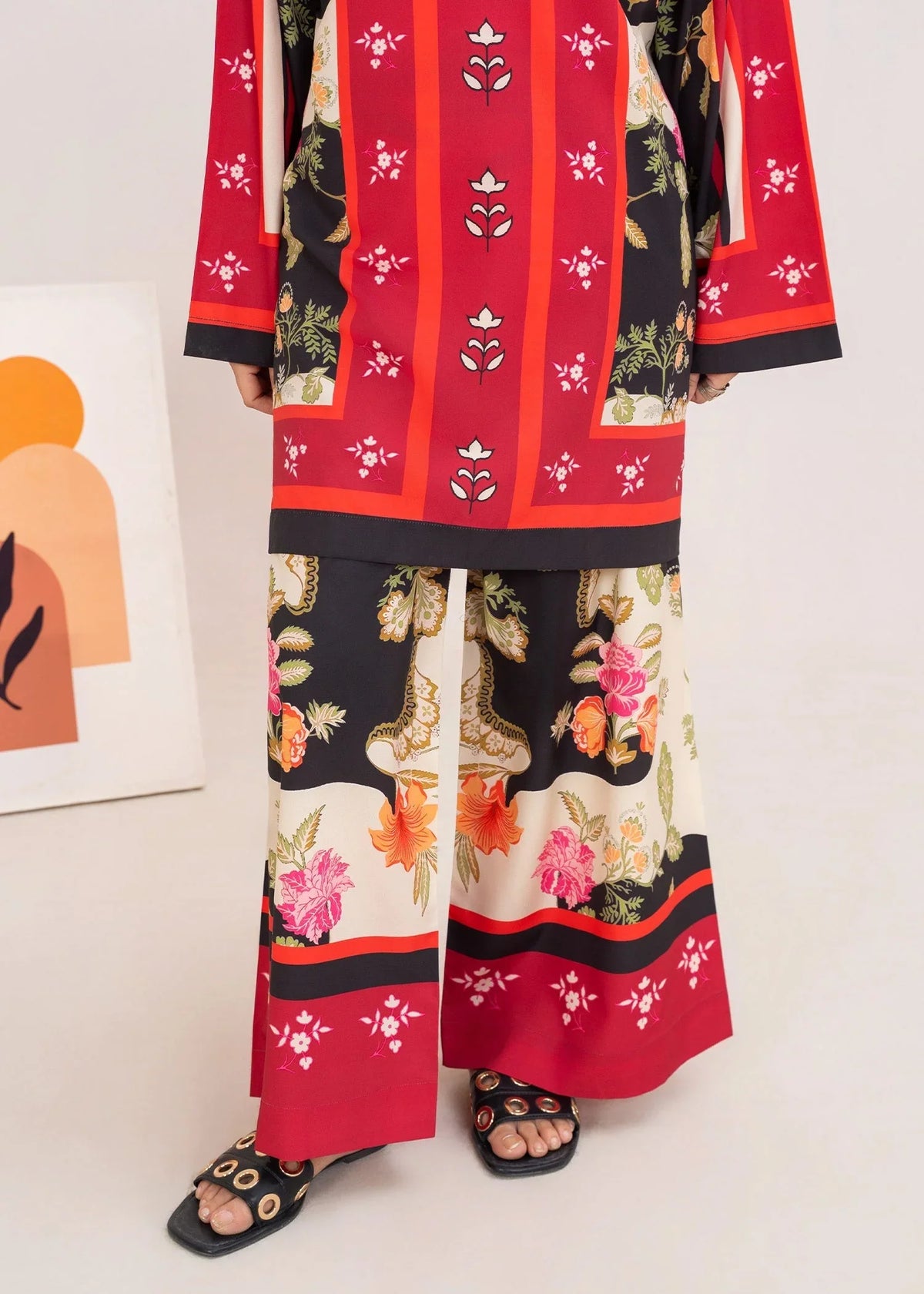 Model wearing red color dress as a bold outfit, shop printed grip 2PC set at Buraqstore
