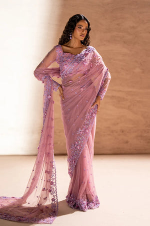 Women wearing rose pink pakistani designer saree in net with handcrafted embroidery, full draped front view from Buraqstore