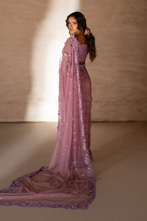 Model wearing rose pink pakistani designer saree, close-up of handcrafted embroidery and 3D floral embellishment on the net, Buraqstore