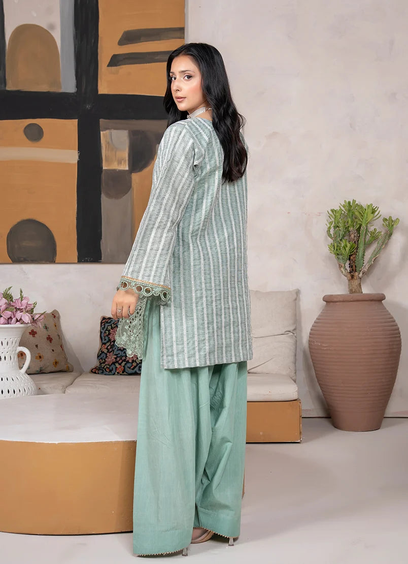 Women wearing sage green dress, close-up of the embroidery on the jacquard fabric texture, Buraqstore
