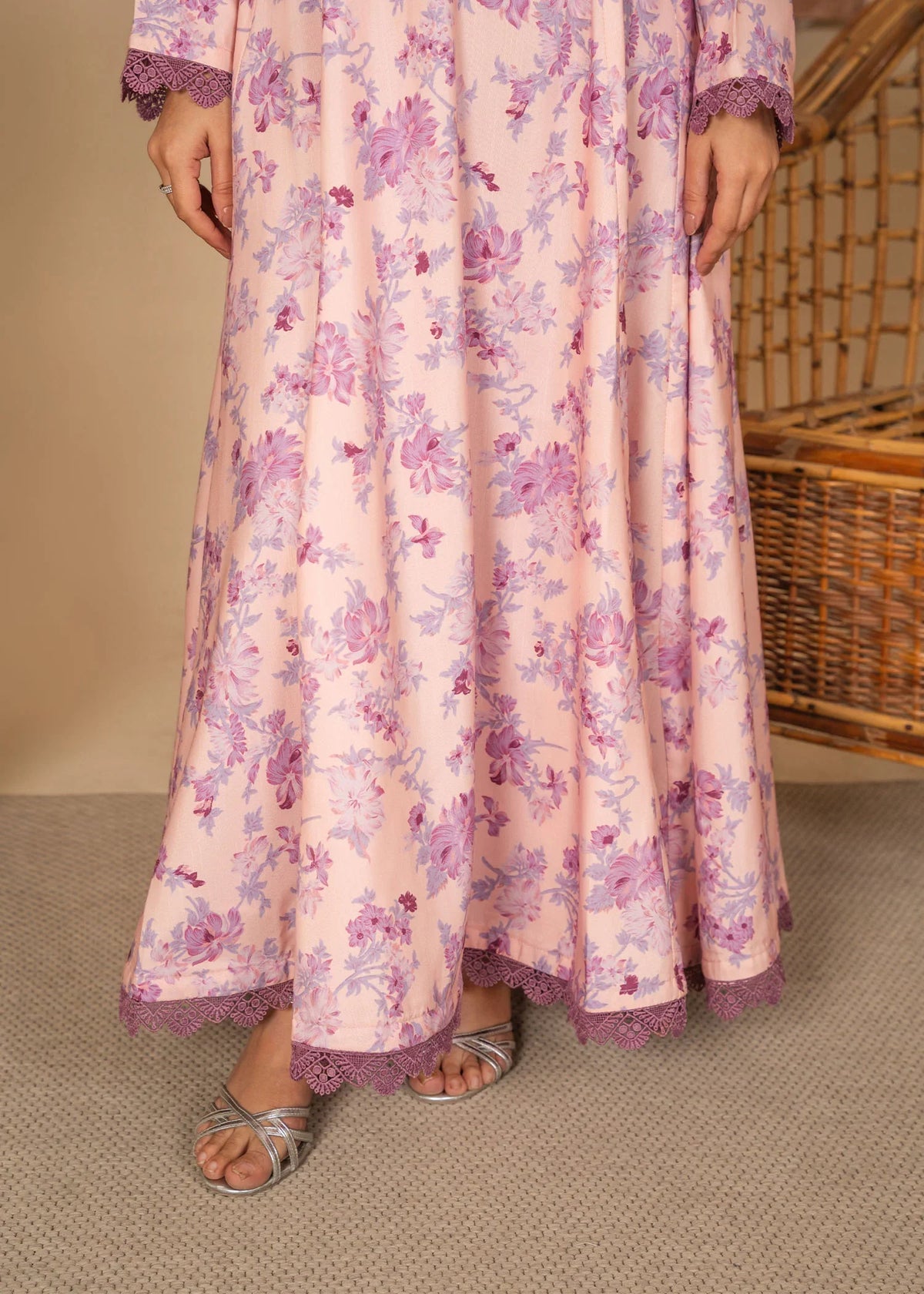 Model wearing simple pink dress pakistani, side view showing the fit of the printed poly lawn 1PC, Buraqstore