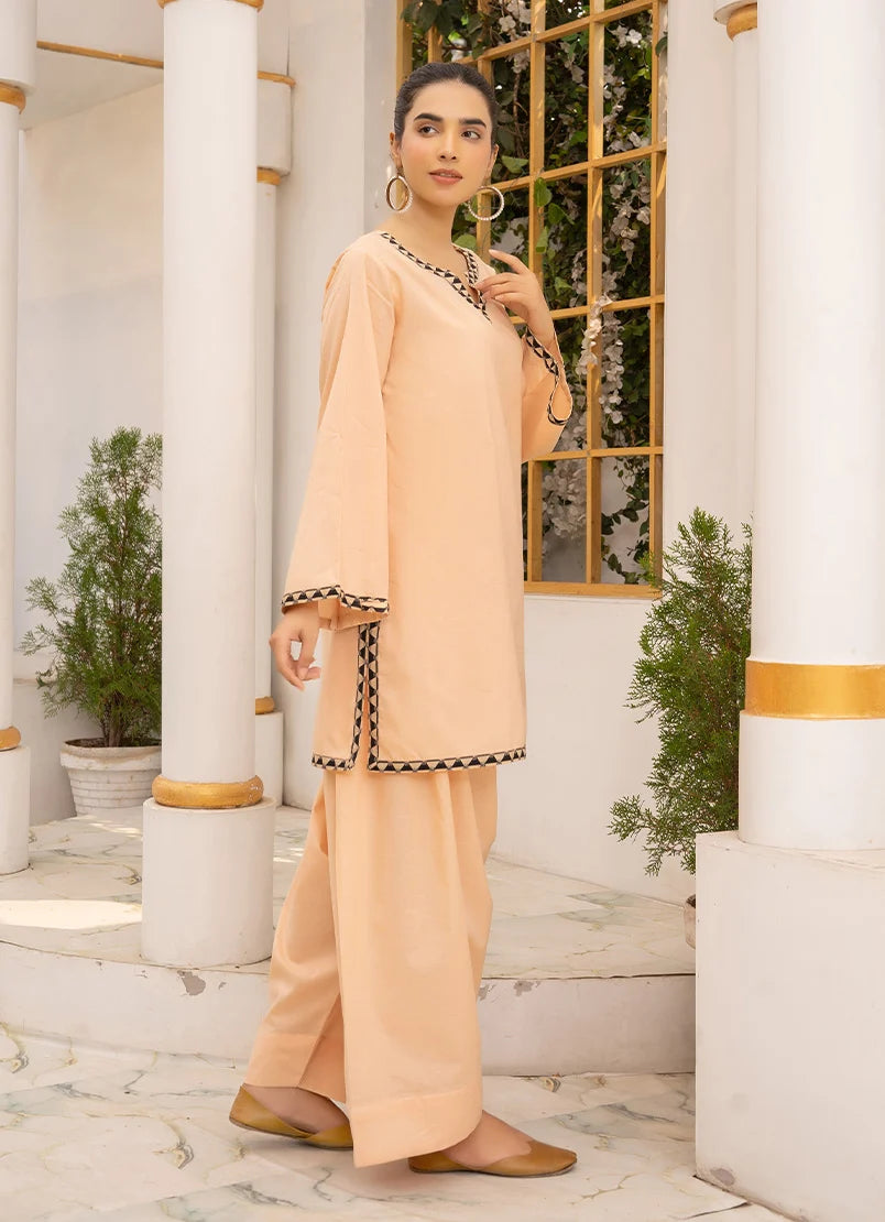 Women wearing co ord set design, close-up of the dori and lace detail on the cotton top, Buraqstore