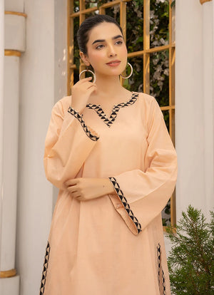 Women wearing co ord set design, back view of the cotton top with dori and lace trim, Buraqstore