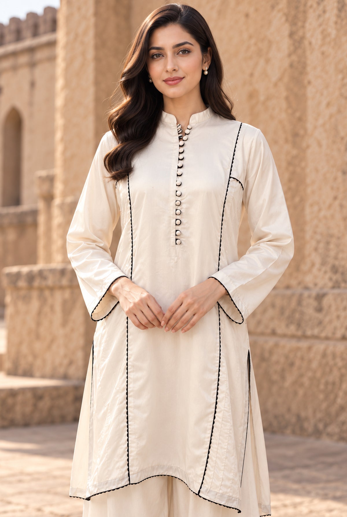 Model wearing linen shirt design for girl 2PC in side profile showing the comfortable fit, stitched dyed linen at Buraqstore