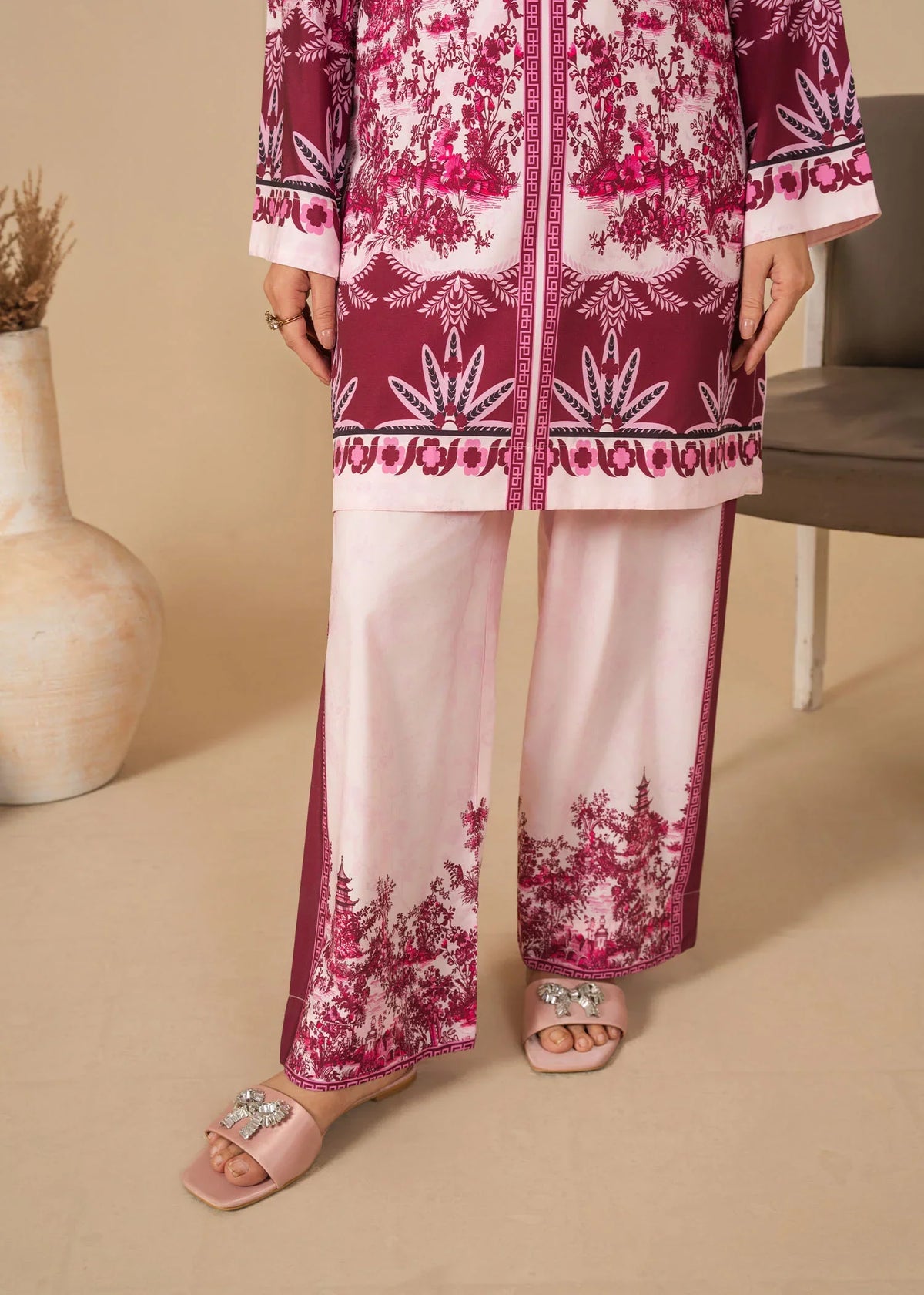 Model wearing stylish silk dress design, side view showing the smooth fall of the printed silk 2PC, Buraqstore