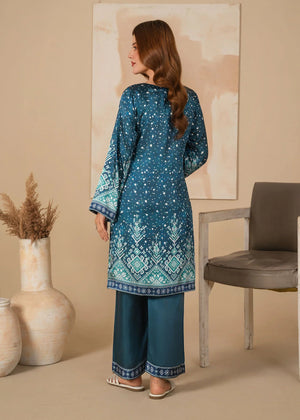 Women wearing teal blue color dress, close-up of the print on the shamooz shirt, Buraqstore