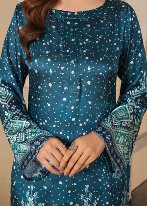 Model wearing teal blue color dress, side view showing the fit of the printed shamooz 2PC, Buraqstore
