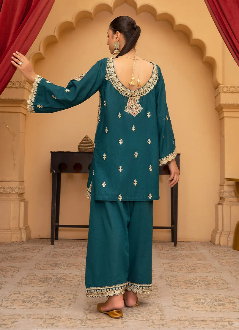 Model wearing teal blue color dress, side view showing the fit of the bana dora 2-piece set, Buraqstore