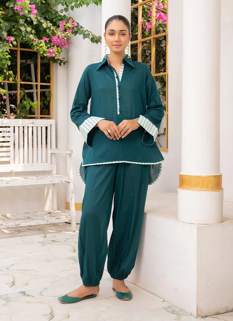Model wearing co ord set women choose in teal green, a cotton top and bottom with dori and lace detailing, front view from Buraqstore