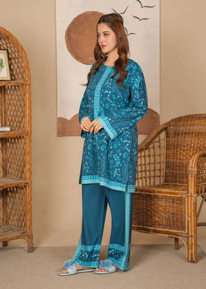 Women wearing teal sea green color dress, close-up of the print on the grip fabric, Buraqstore