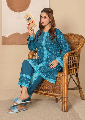 Model wearing teal sea green color dress as a daily outfit, shop printed grip 2PC at Buraqstore
