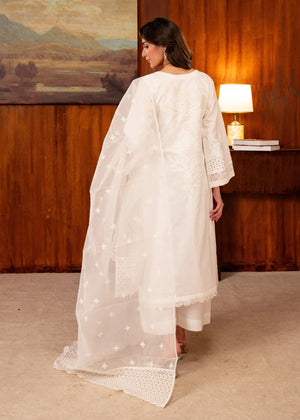 Women wearing white dress design, close-up of the embroidery on the lawn shirt, Buraqstore