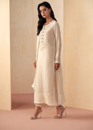 Model wearing white dress design, an embroidered and embellished chiffon shirt with grip trouser, front view from Buraqstore