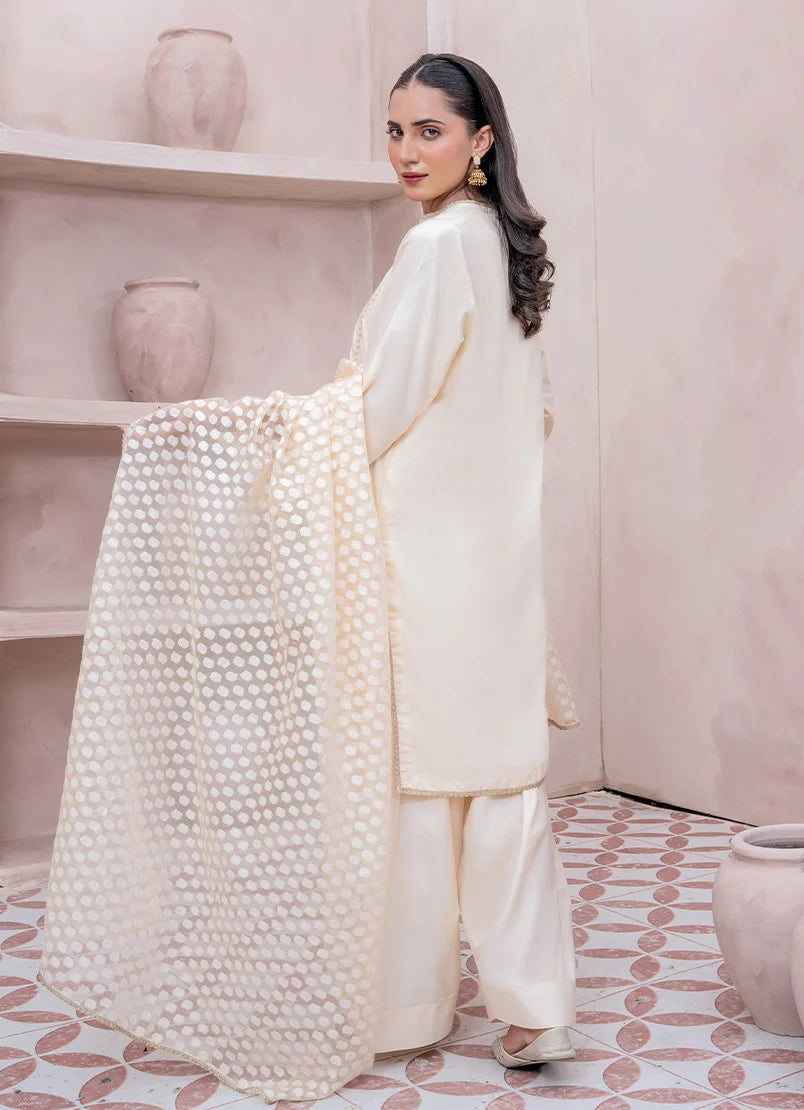 Model wearing white dress for women, side view showing the fall of the raw silk 3-piece set, Buraqstore