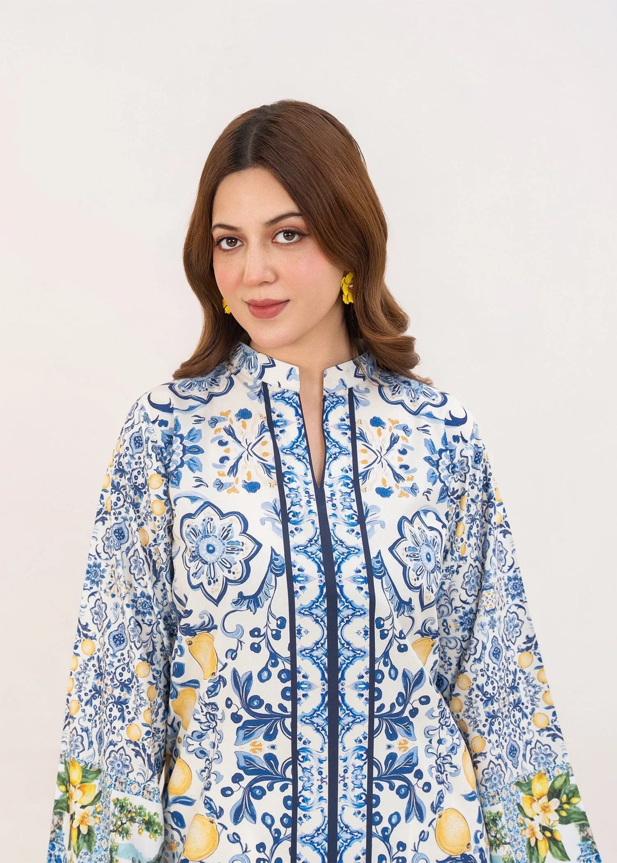 Model wearing white co ord set design as a casual outfit, shop printed grip 2-piece online at Buraqstore