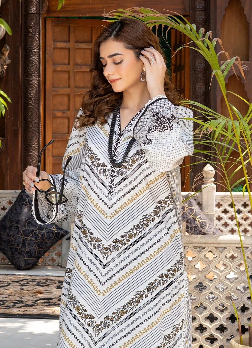 Model wearing white dress design, side view showing the fit of the printed lawn 2PC, Buraqstore