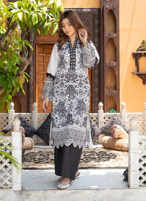 Model wearing simple white dress design, a printed lawn shirt and trouser 2PC, front view from Buraqstore