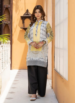Model wearing plain white dress design, a printed lawn shirt and trouser 2PC, front view from Buraqstore