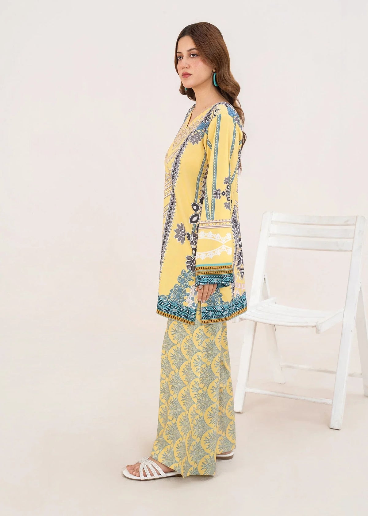 Women wearing yellow 2 piece co ord set Pakistan, side view showing the fit of the printed grip set, Buraqstore