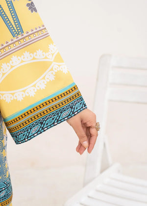 Model wearing yellow 2 piece co ord set Pakistan, close-up of the print on the grip fabric, Buraqstore