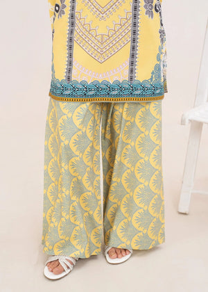 Women wearing yellow 2 piece co ord set Pakistan as a casual outfit, shop printed grip 2-piece online at Buraqstore